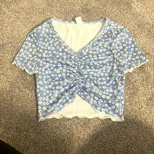 This a a blue flower shirt from Shein